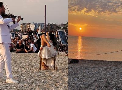 Civitanova, "Viva la Vita" emoziona all’alba: folla in spiaggia per il violino di Alessandrini