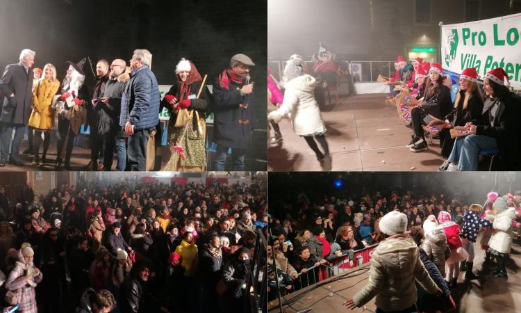 Macerata, la Befana vien giù... dalla torre civica: in migliaia in piazza per l'evento. Eletta la nuova Miss